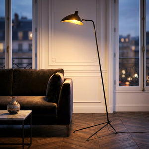 Lampadaire trépied noir salon parisien velours