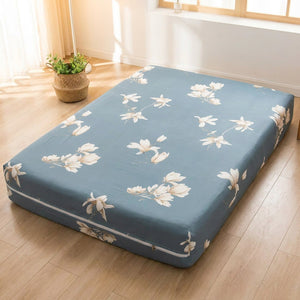 Housse de matelas intégrale à motif magnolia bleu-gris avec fermeture éclair visible