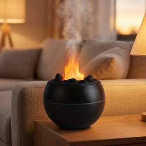 Diffuseur d'huile essentielle noir a effet flamme orange et brume dans un salon