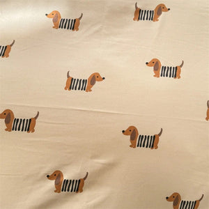 Gros plan du motif chien imprimé sur le tissu de la housse de couette