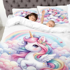 Enfants endormis sous la parure de lit licorne pastel