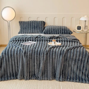 Plaid flanelle rayé plié montrant les différentes couleurs disponibles