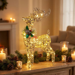 Renne de Noël doré lumineux en fil de métal sur console
