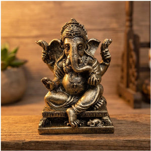 Statue Ganesha bronze patiné modèle trône