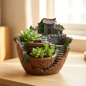 Pot de fleurs village miniature en terre cuite garni de plantes succulentes