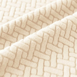 Gros plan du tissu jacquard tissé effet chevrons de la housse de fauteuil