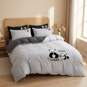 Parure de lit panda grise ambiance cocooning avec tete de lit en rotin