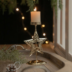 Chandelier de Noël doré à motif étoile à cinq branches avec bougie allumée