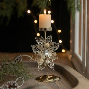 Chandelier de Noël doré à motif fleur de Noël avec bougie allumée