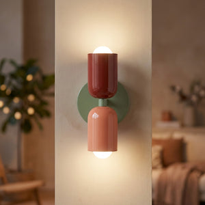 Applique murale LED double tête rouge et rose sur socle vert