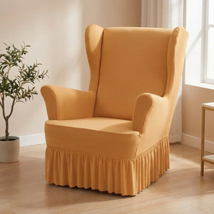 Housse de fauteuil à oreilles ocre avec jupe à volants