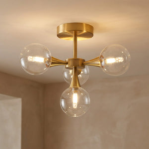 Lustre art deco coloris transparent modele 4 globes bouquet