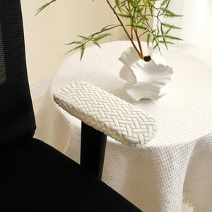 Housse d'accoudoir jacquard crème sur chaise de bureau
