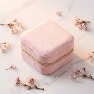 Boîte à bijoux en velours rose sakura avec fermeture éclair dorée