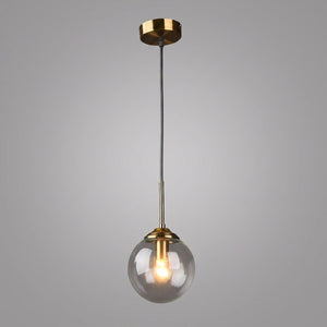 Suspension globe en verre transparent avec monture laiton dore