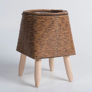 Cache-pot rotin conique brun avec pieds en bois