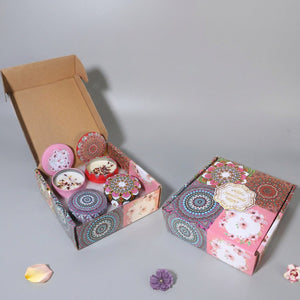 Coffret de quatre bougies parfumées bohème aux tons roses
