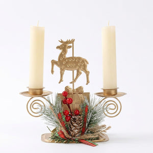 Bougeoir de Noël Double Renne doré en métal avec deux bougies allumées