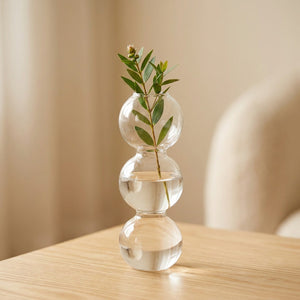 Petit vase en verre à bulles 17 cm avec une tige fleurie