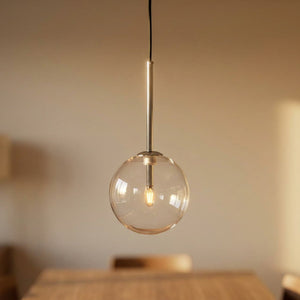 Suspension boule en verre transparent avec tige argentée allumée