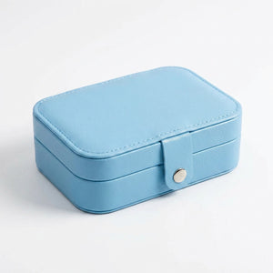 Boite à bijoux de voyage couleur bleu ciel en simili cuir