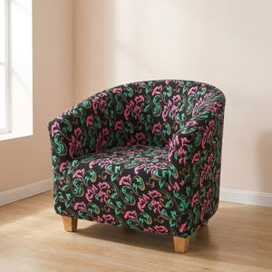 Fauteuil club housse motif baroque rose et vert sur fond noir