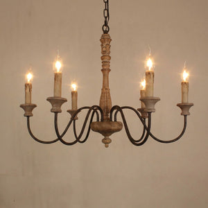 Lustre marron vieilli à bougies LED sur mur clair