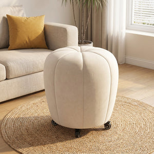 Pouf tabouret citrouille crème avec roulettes sur tapis en jonc de mer