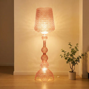 Lampadaire acrylique rose ajouré façon dentelle allumé design italien