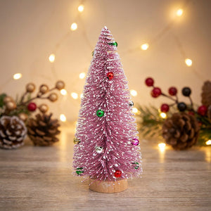 Sapin de Noël miniature rose avec petites boules sur socle en bois