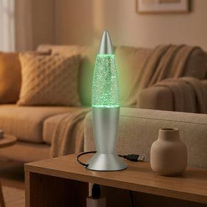 Lampe à lave USB argentée allumée en vert sur une console de salon