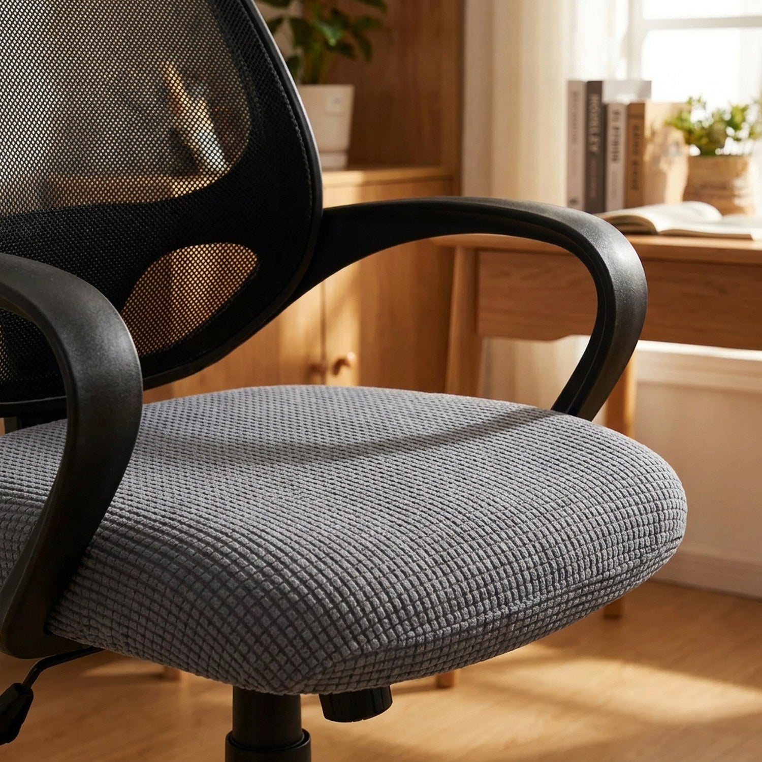 Gros plan sur la maille texturée de la housse d'assise