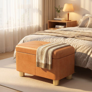 Pouf coffre de rangement au pied d'un lit dans une chambre chaleureuse