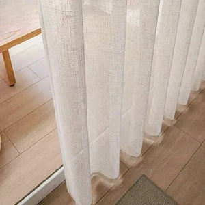 Détail du tissage naturel du voilage tombant au sol