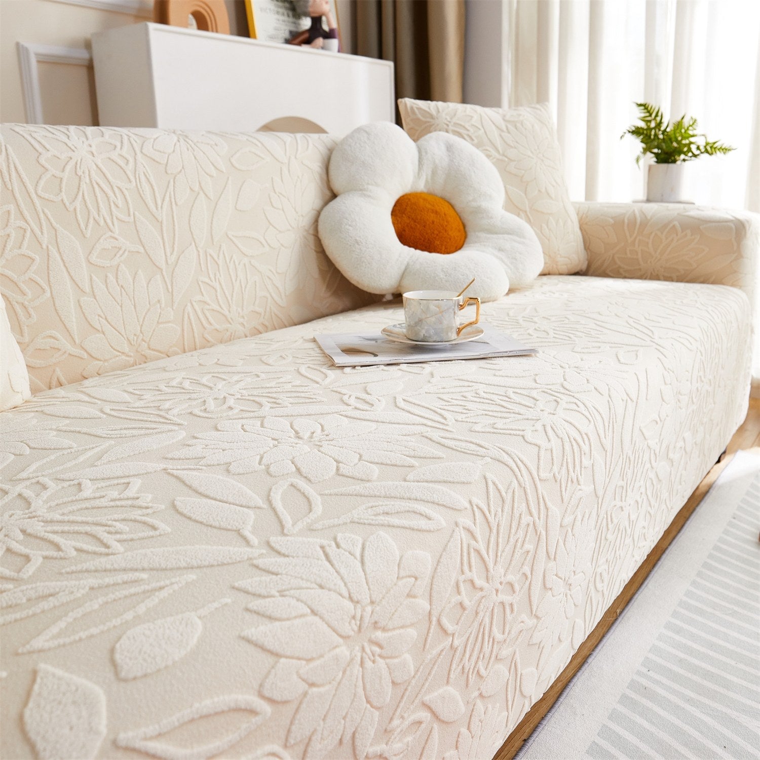 Housse de canapé jacquard beige installée