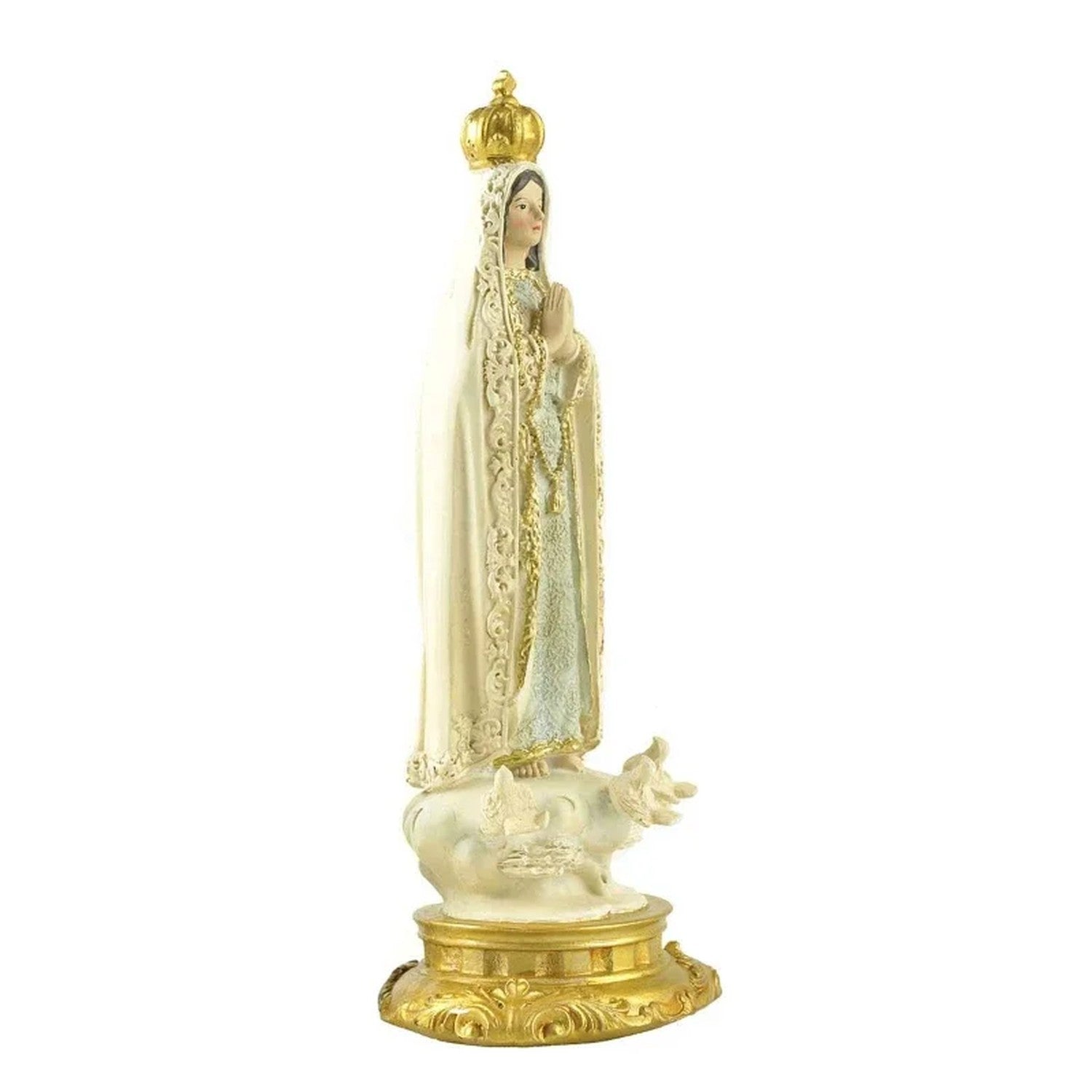 Profil de la statue de la vierge Marie montrant le voile bordé de dorures