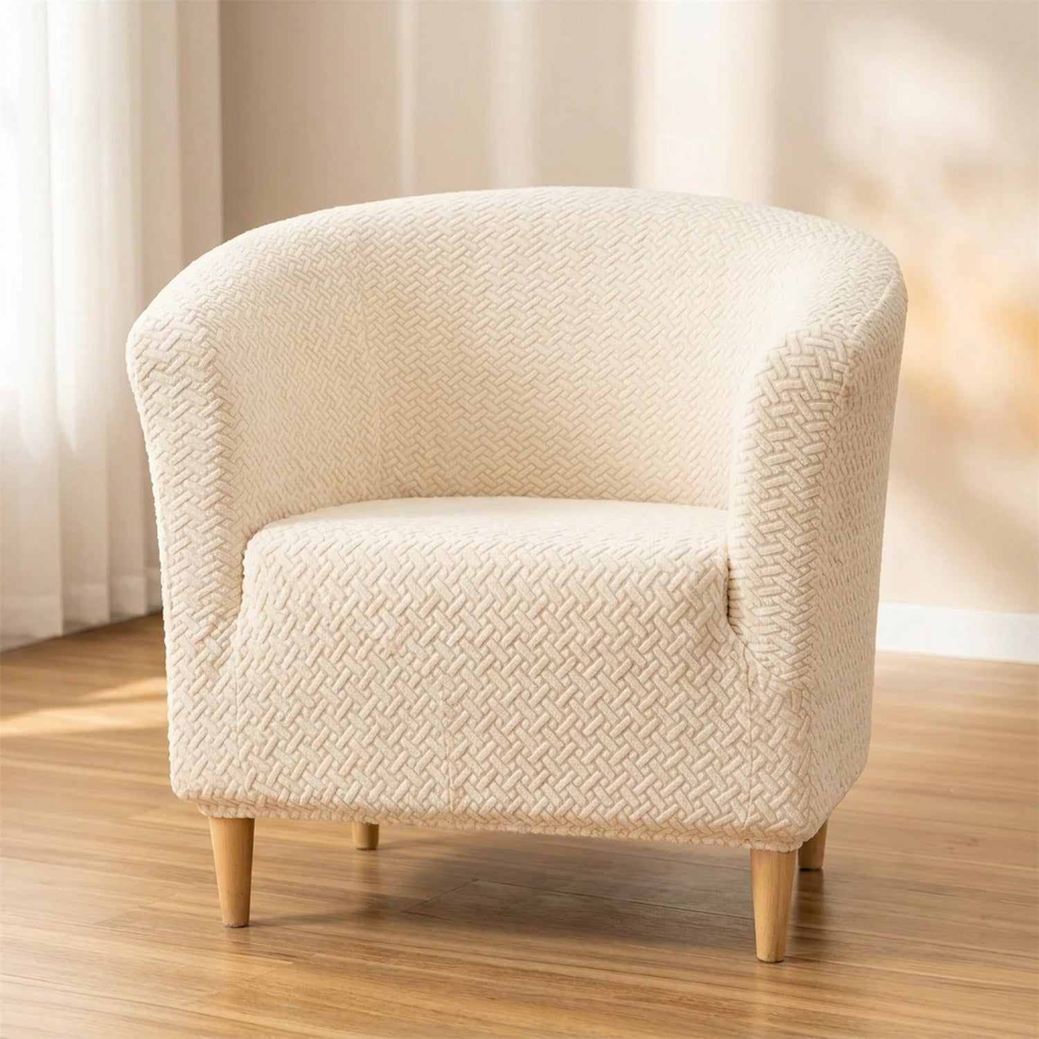 Housse de fauteuil club en jacquard texturé écru sur un fauteuil cabriolet