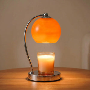 Lampe chauffe-bougie coloris orange avec globe en verre translucide