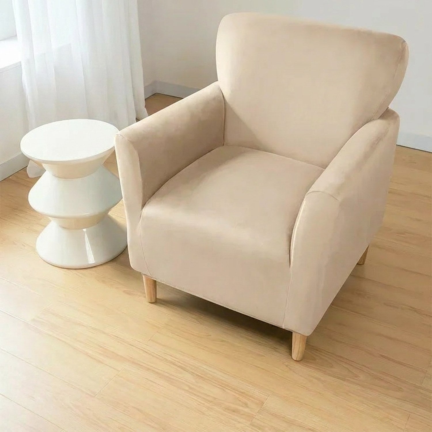 Housse de fauteuil club couleur Bronze installée sur un fauteuil