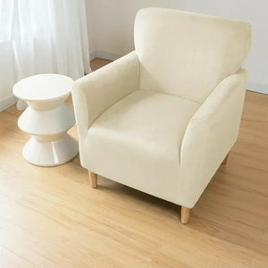 Housse de fauteuil club couleur Beige installée sur un fauteuil