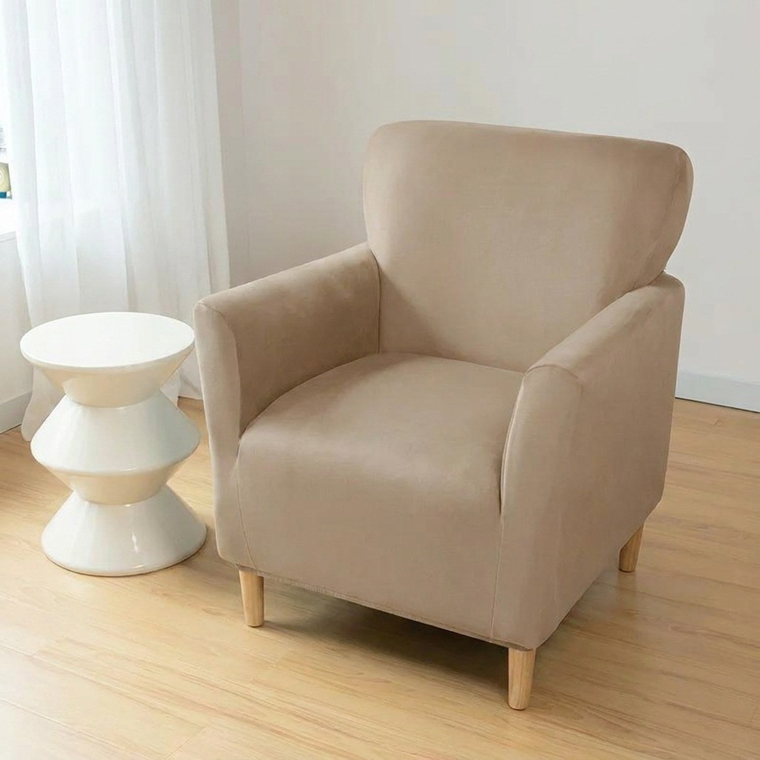 Housse de fauteuil club couleur Terracota installée sur un fauteuil