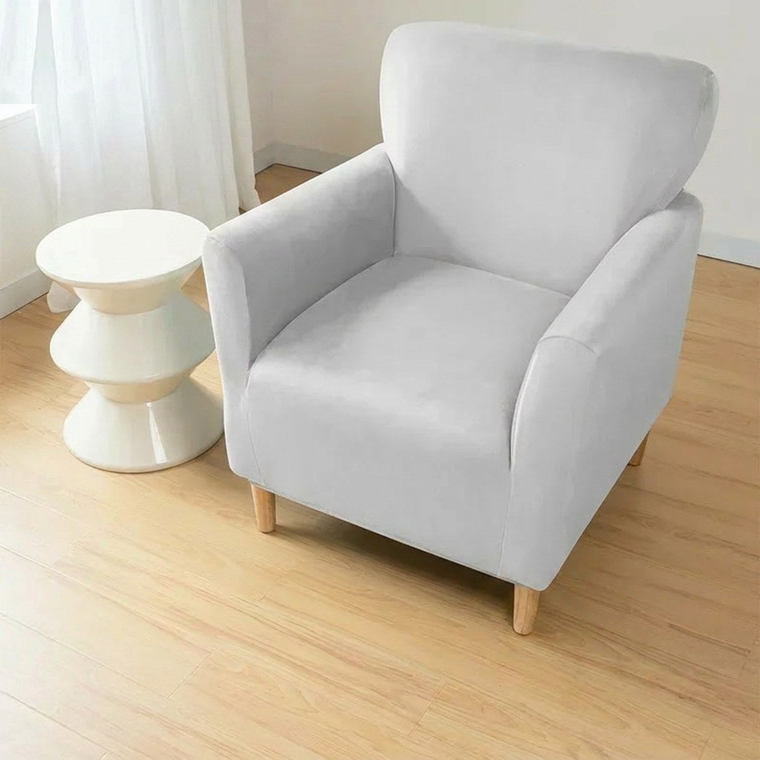 Housse de fauteuil club couleur Argenté installée sur un fauteuil
