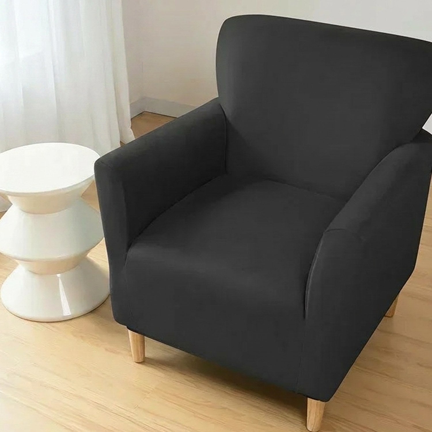 Housse de fauteuil club couleur Noir installée sur un fauteuil