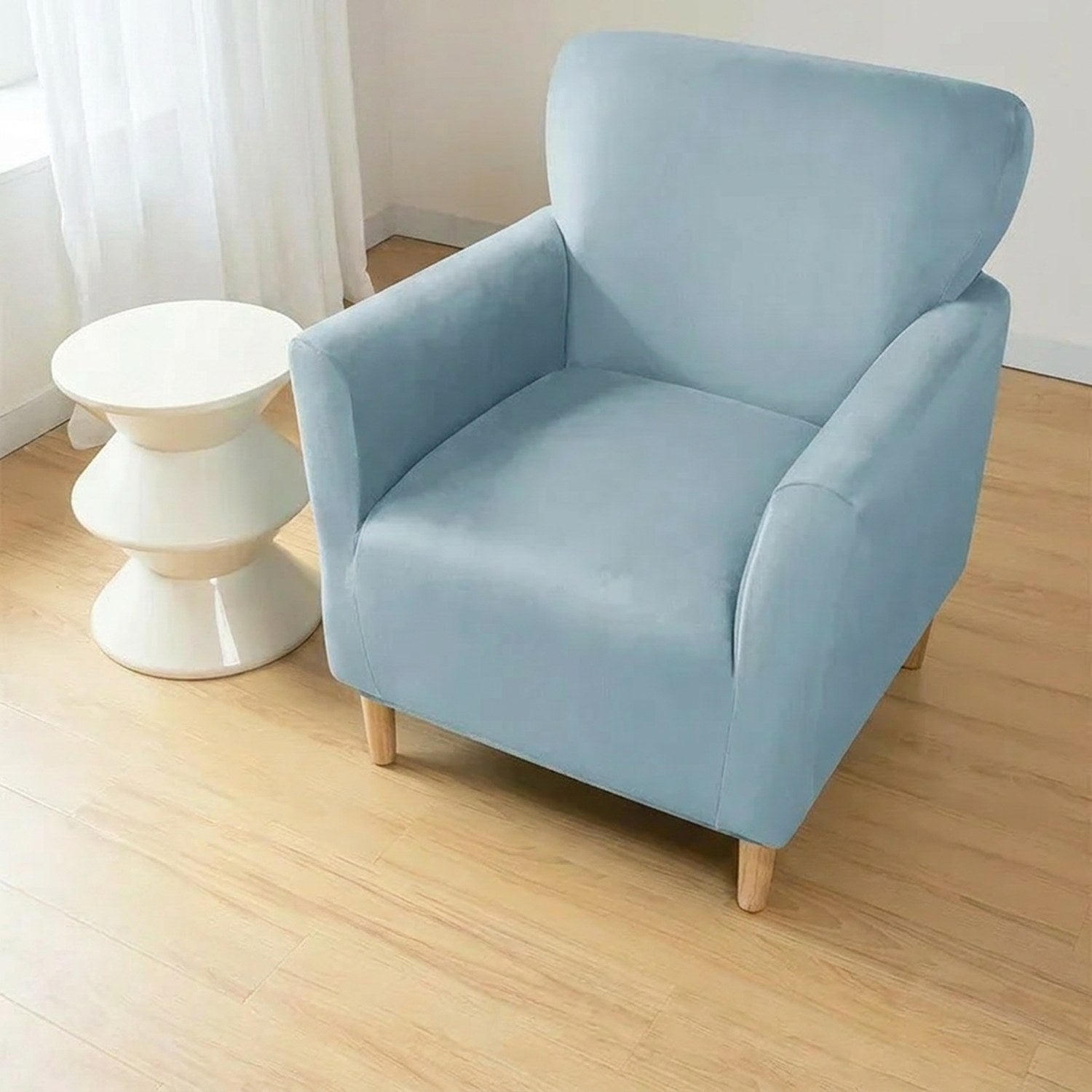 Housse de fauteuil club couleur Bleu installée sur un fauteuil