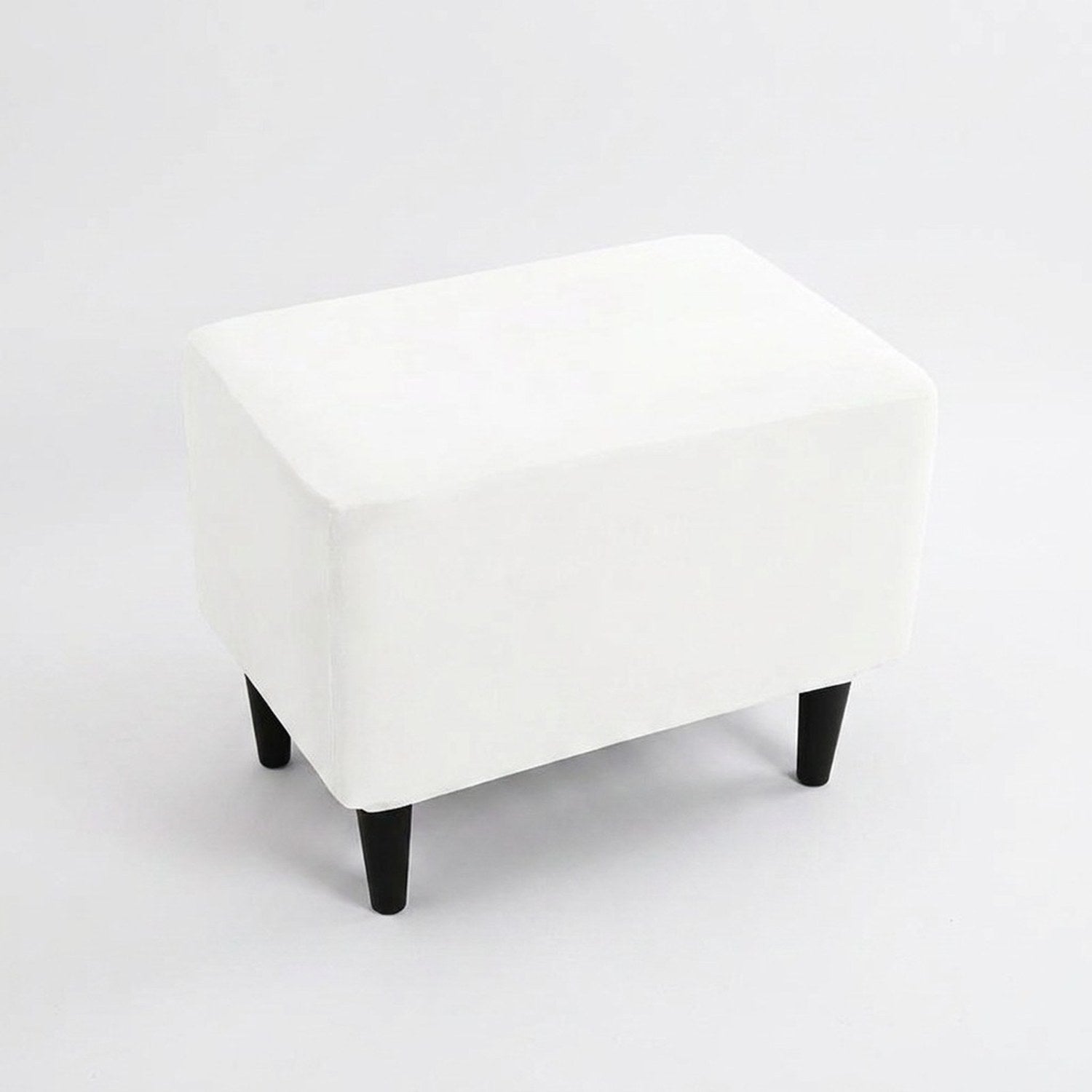 Housse de repose-pieds couleur Blanche posée sur un pouf