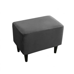 Housse de repose-pieds couleur Noir posée sur un pouf