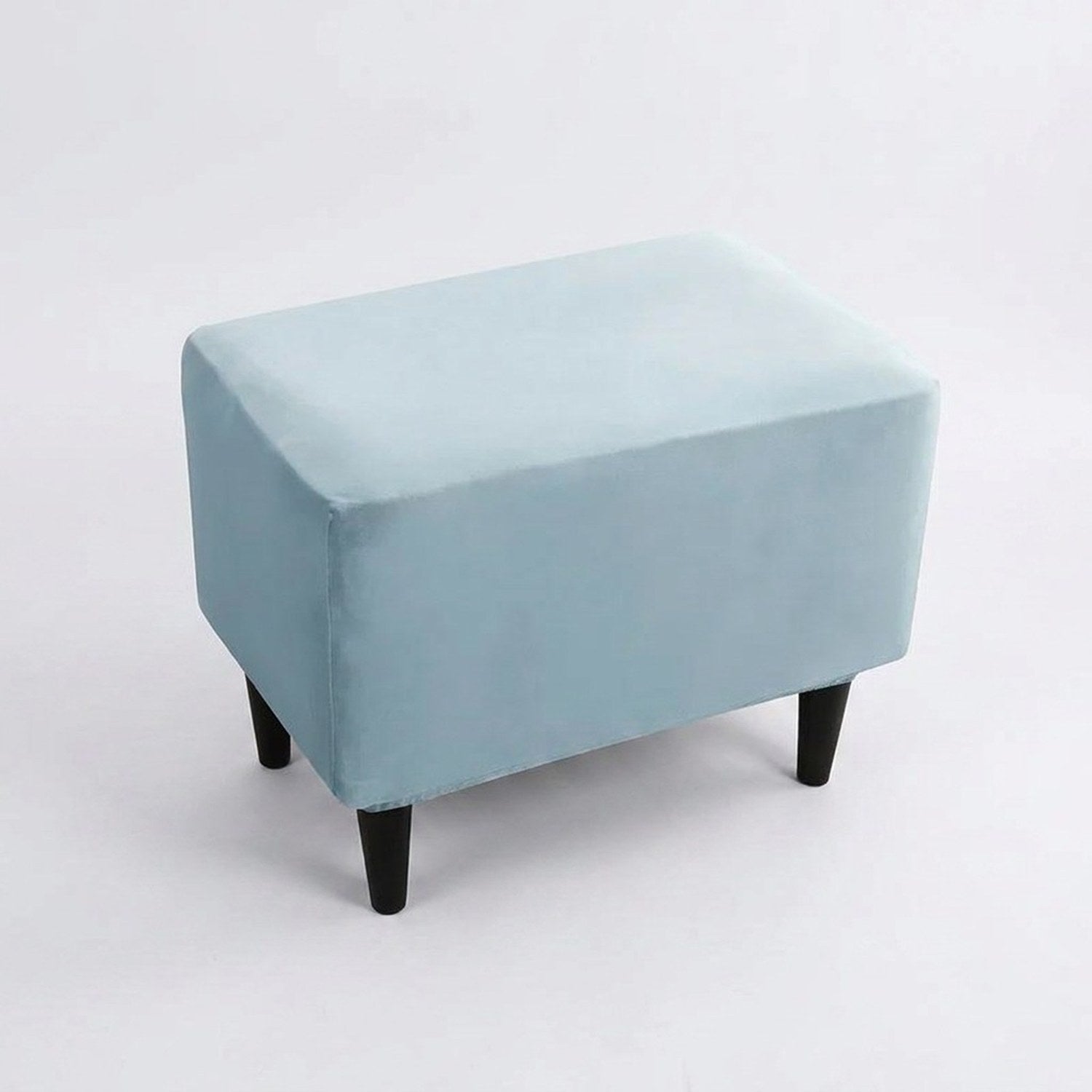 Housse de repose-pieds couleur Bleu posée sur un pouf
