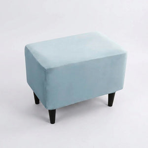 Housse de repose-pieds couleur Bleu posée sur un pouf