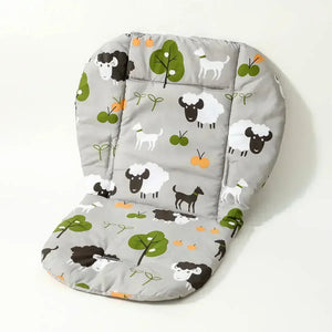 Coussin de chaise haute à motif d'animal avec illustrations de petits animaux et éléments naturels, offrant une assise rembourrée et un dossier confortable adapté aux tout-petits.