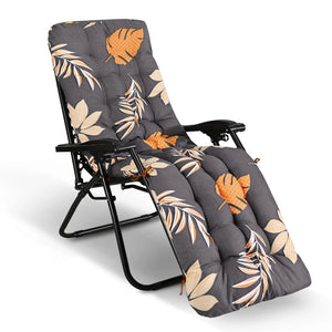 Coussin de chaise longue à motif floral, avec capitonnage visible et imprimé végétal, installé sur une chaise longue inclinable pour une assise confortable et décorative.